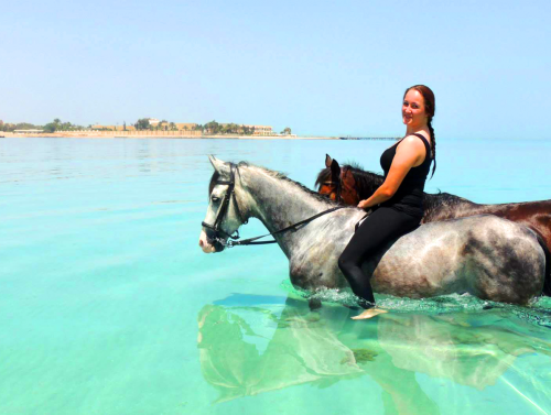 girl2horsesswimming-1600x900